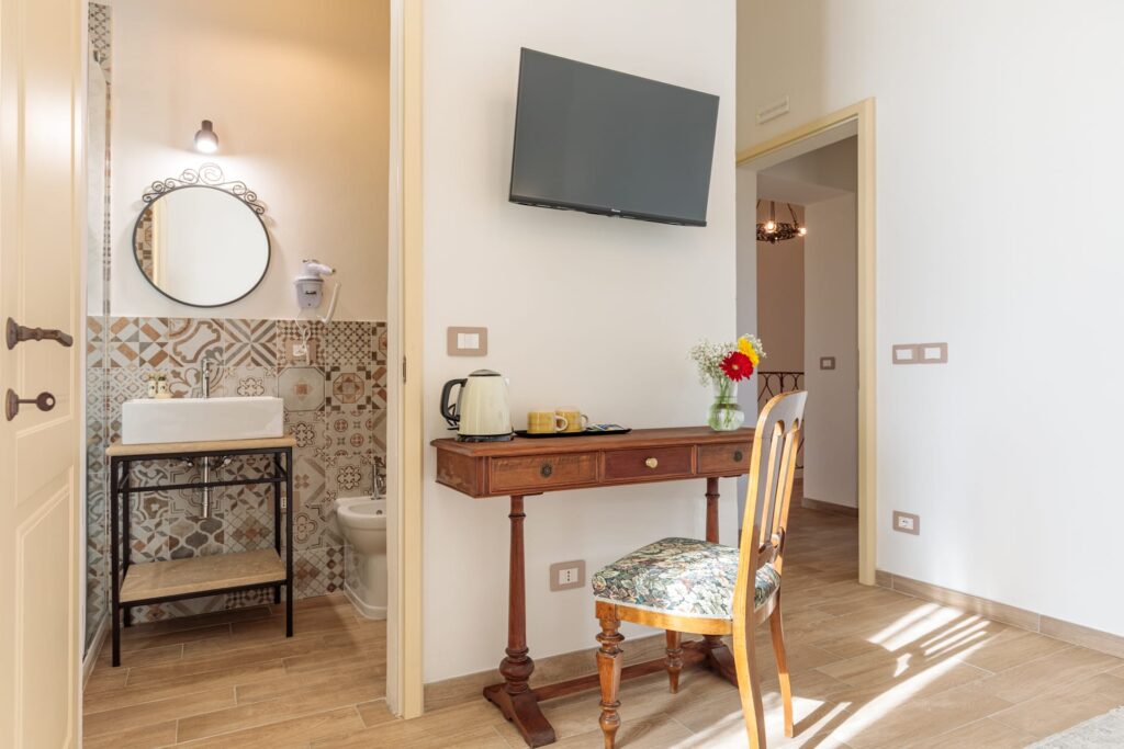Camera di Villa Fontis Rapolano con Smart TV, bollitore, bagno privato e area relax per un soggiorno a Rapolano Terme